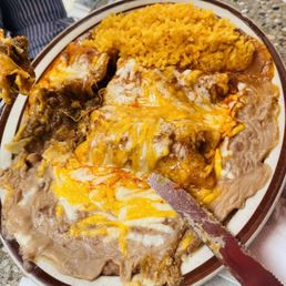 Shredded beef enchiladas plate Shredded beef enchiladas plate