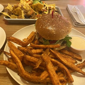 Veggie Grill by Next Level - House Veggie Burger was phenomenal!!! Southwestern Nachos in the background - Vegan Near Me - Seattle, Washington Veggie Grill by Next Level - House Veggie Burger was phenomenal!!! Southwestern Nachos in the background - Vegan Near Me - Seattle, Washington