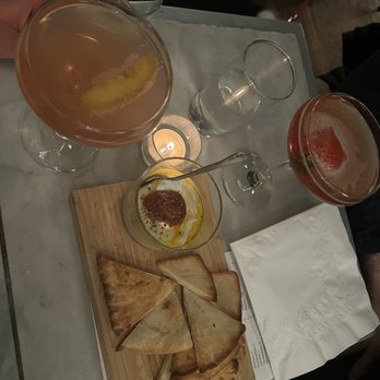 Brennan's - two of their cocktails and hummus with naan - Wine Bars Near Me - Saint Louis, Missouri