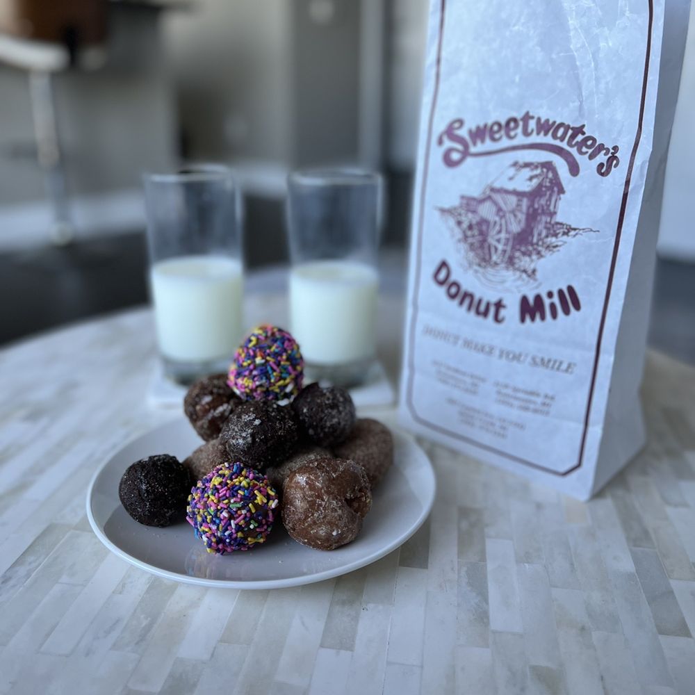 Sweetwater's Donut Mill - a plate of donuts and a bag of milk - Donuts Near Me - Kalamazoo, Michigan Sweetwater's Donut Mill - a plate of donuts and a bag of milk - Donuts Near Me - Kalamazoo, Michigan