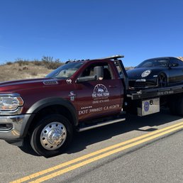Porsche being towed out n flatbed. Porsche being towed out n flatbed.