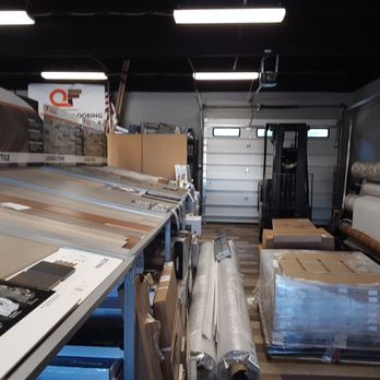 Overstock Flooring - The last aisle, with ceramic tile , carpet and linoleum. - Flooring Near Me - Rochester, New York