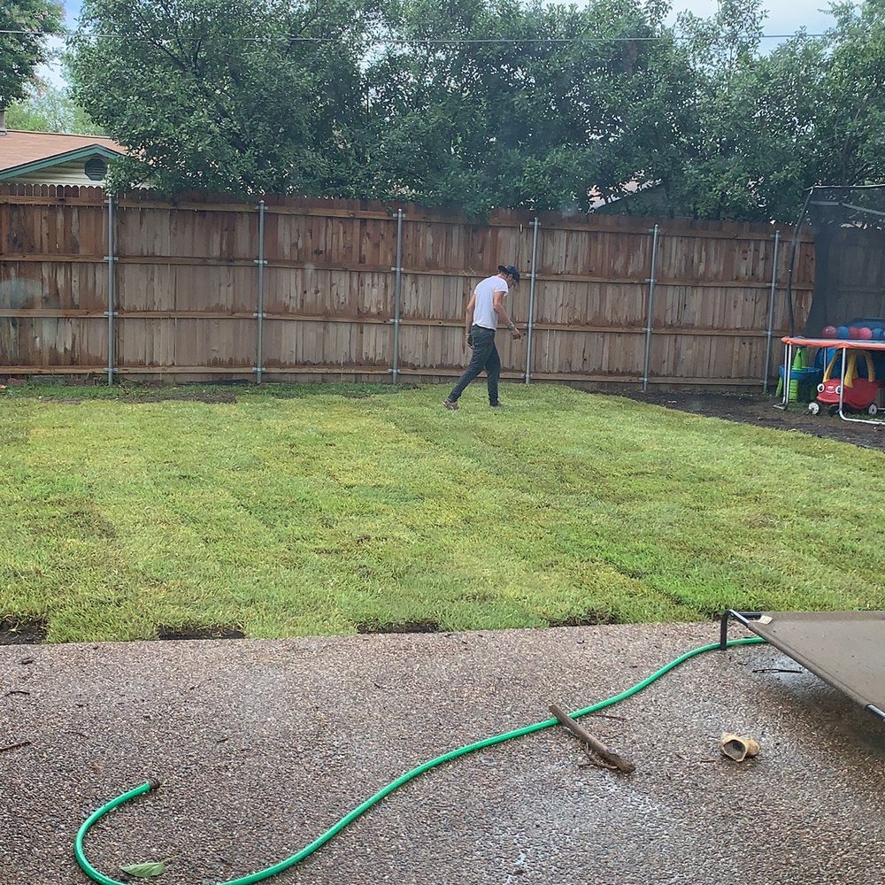 One Awesome Dad - a man in a backyard playing with a water hose - Landscaping Near Me - Keller, Texas One Awesome Dad - a man in a backyard playing with a water hose - Landscaping Near Me - Keller, Texas