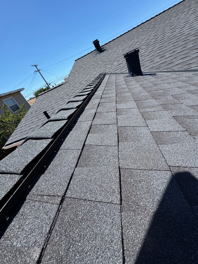 Slide of Acme Roofing Services