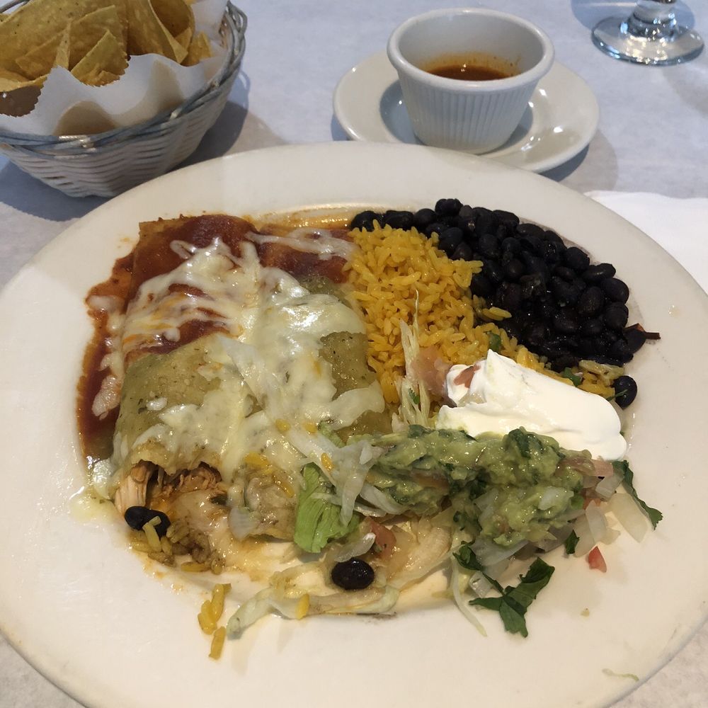 Enchilada Lunch Special (I took a bite) and Side of Chips and Salsa Enchilada Lunch Special (I took a bite) and Side of Chips and Salsa