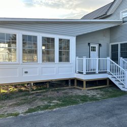 Grace Jane Contracting - Sunroom exterior remodel. All PVC/composite material. Trex composite deck.