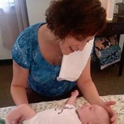 Awakening Wellness Healing Services - Working on newborn