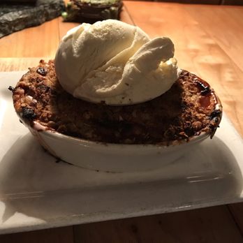 A'Town Bistro - Dessert. Strawberry and Rhubarb crisp with ice cream. - New American Near Me - Anacortes, Washington A'Town Bistro - Dessert. Strawberry and Rhubarb crisp with ice cream. - New American Near Me - Anacortes, Washington