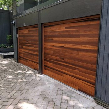 Green T Garage Doors - Planks style garage doors in accent woodtone color - Garage Door Services Near Me - Aurora, Illinois Green T Garage Doors - Planks style garage doors in accent woodtone color - Garage Door Services Near Me - Aurora, Illinois
