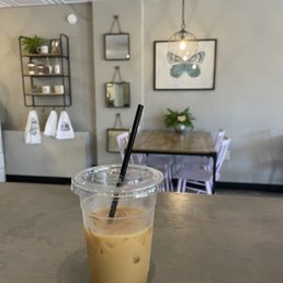 a cold beverage in a plastic cup