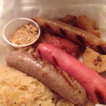 Ulrich's Tavern - Octoberfest plate, 3 different sausages with sauerkraut and German potatoes with whole grain mustard. Very good.. - New American Near Me - Buffalo, New York Ulrich's Tavern - Octoberfest plate, 3 different sausages with sauerkraut and German potatoes with whole grain mustard. Very good.. - New American Near Me - Buffalo, New York