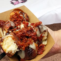Pine/Strawberry Summer Fest - Sassy's Cafe Bakery from Mesa had these amazing cinnamon rolls with chocolate and vanilla sauce and topped with bacon brittle!