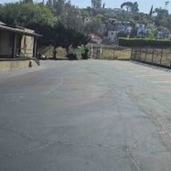 Jimenez Paving - Untreated parking lot - General Contractors Near Me