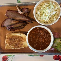 Regular Brisket Meal with coleslaw, beans and garlic bread. Regular Brisket Meal with coleslaw, beans and garlic bread.