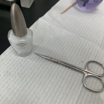 Osley Beauty Spa - Cuticle Remover Gel and thin scissors used to remove little to no cuticles - Hair Salons Near Me - Dania Beach, Florida Osley Beauty Spa - Cuticle Remover Gel and thin scissors used to remove little to no cuticles - Hair Salons Near Me - Dania Beach, Florida