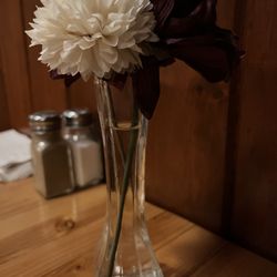 Merlino's Family Steakhouse - Silk flowers with water in the vase. Why?