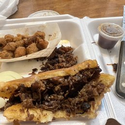 31 bucks for 2 of these overcooked brisket sandwiches.