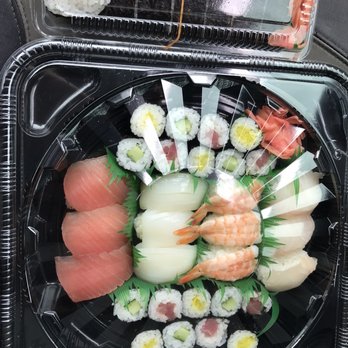 Kozo Sushi - Hibiscus platter and futomaki roll - Japanese Near Me - Kaneohe, Hawaii Kozo Sushi - Hibiscus platter and futomaki roll - Japanese Near Me - Kaneohe, Hawaii