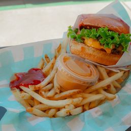 Double cheese burger and fries. Double cheese burger and fries.