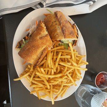 Walter's - Grilled chicken sandwich on a baguette with French fries - New American Near Me - Brooklyn, New York
