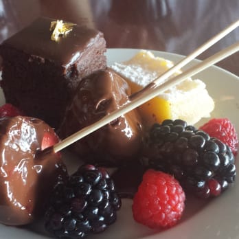 Orange Hill Restaurant & Events - Chocolate cake with gold leaf, lemon bar, chocolate covered strawberries from fountain, and berries - Steakhouses Near Me - Orange, California