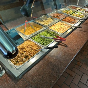 Ocean Garden Buffet - food being prepared in a buffet - Buffets Near Me - Toledo, Ohio