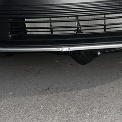 Caliber Collision - Before where the plastic was off at the bottom of the car.