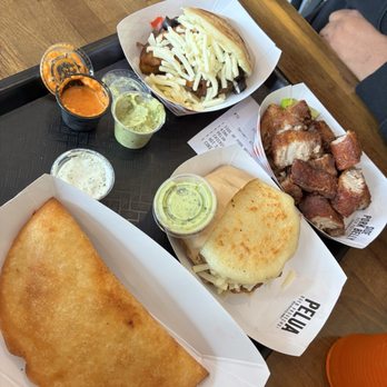 Arepa Queen - King arepa, pork belly, shredded chicken empanadas. - Venezuelan Near Me - Frederick, Maryland