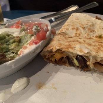 Holy Tequila Mexican Kitchen - Holy Quesadilla with Carnitas - Mexican Near Me - Hilton Head Island, South Carolina Holy Tequila Mexican Kitchen - Holy Quesadilla with Carnitas - Mexican Near Me - Hilton Head Island, South Carolina