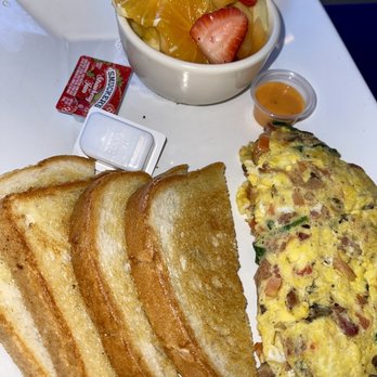 Frida's Cafe - Hummingbird omelette w fresh fruit and sourdough - Cafes Near Me - Tucson, Arizona