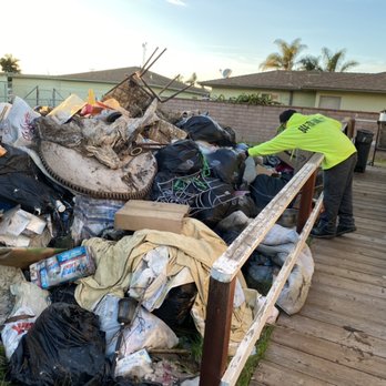 Migos Junk Removal Oxnard - Big pile of trash? No worries. Taller then employee - Junk Removal & Hauling Near Me - Oxnard, California