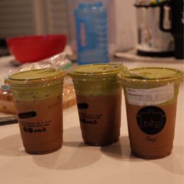 Coffee with matcha foam
