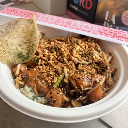 Gochujang Salmon Poke Bowl featuring the Taro Chips Gochujang Salmon Poke Bowl featuring the Taro Chips