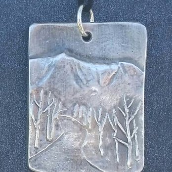 North Light Gallery - Silver pendant of Katahdin from the Golden Road by Suzanne Savage Brewer - Art Galleries Near Me - Millinocket, Maine North Light Gallery - Silver pendant of Katahdin from the Golden Road by Suzanne Savage Brewer - Art Galleries Near Me - Millinocket, Maine