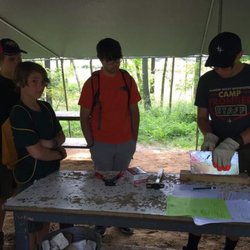 Scouts taking the metalworking merit badge at Camp Frontier.