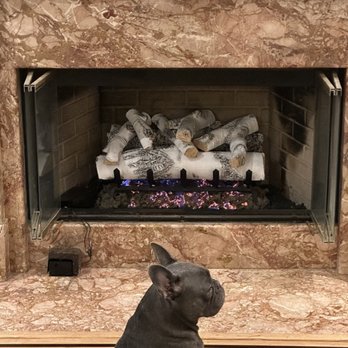 Encino Fireplace Shop - Dog enjoys warming by the fire. - Fireplace Services Near Me - Encino, California