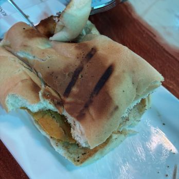 Traditions Global Cuisine - Partly eaten. The coco bread and beef patty. Fire! - Cocktail Bars Near Me - Morrow, Georgia Traditions Global Cuisine - Partly eaten. The coco bread and beef patty. Fire! - Cocktail Bars Near Me - Morrow, Georgia