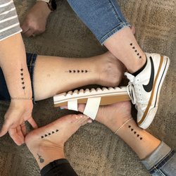 Monolith Tattoo Studio - 5 of us came to get the same tattoo.
