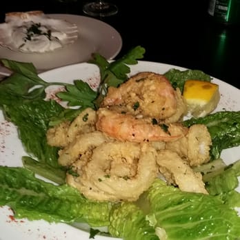 Bon Gusto - Calamari served with a king prawn topping - Italian Near Me - London, XGL