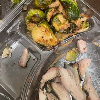 Urban Plates - Chicken and brussel sprouts. The hard stems that you couldn't chew are in the top left corner. Threw this all away sadly. - Salad Near Me - Pasadena, California