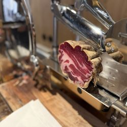 Hotel Innsbruck - Cut your own prosciutto at a breakfast restaurant