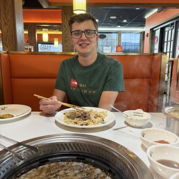 Ombu Hot Pot - Grandson with fried rice. He's been before which was nice as he made great food recommendations. - Hot Pot Near Me - South Jordan, Utah Ombu Hot Pot - Grandson with fried rice. He's been before which was nice as he made great food recommendations. - Hot Pot Near Me - South Jordan, Utah