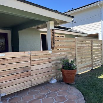 Larry's Fence - Fence in courtyard with gates. - Fences & Gates Near Me