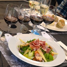 Prosciutto salad in front, vegetarian empanadas in background, red and white wine tastings. Prosciutto salad in front, vegetarian empanadas in background, red and white wine tastings.
