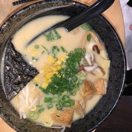 Curly noodle ramen, the Miso soup version, with chicken broth instead, plus tofu