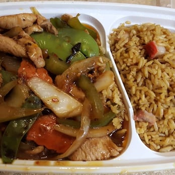Dragon & Phoenix Express - Hunan Chicken (meh) with "Fried Rice" aka yellow rice with pork bits (no soy sauce, no egg, no veggies) - Chinese Near Me - Conshohocken, Pennsylvania Dragon & Phoenix Express - Hunan Chicken (meh) with "Fried Rice" aka yellow rice with pork bits (no soy sauce, no egg, no veggies) - Chinese Near Me - Conshohocken, Pennsylvania