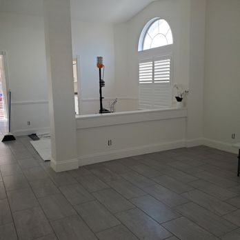 Tile Dynamics - From the hallway showing part of the living room and dining room area - Flooring Near Me Tile Dynamics - From the hallway showing part of the living room and dining room area - Flooring Near Me