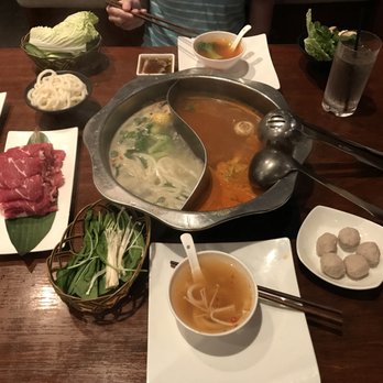 Q Restaurant - Hot pot -- basic broth, kimchi. Beef and lamb combo, sirloin combo -- comes with a veggie platter and noodles (udon in picture). Pork balls - Chinese Near Me - Boston, Massachusetts