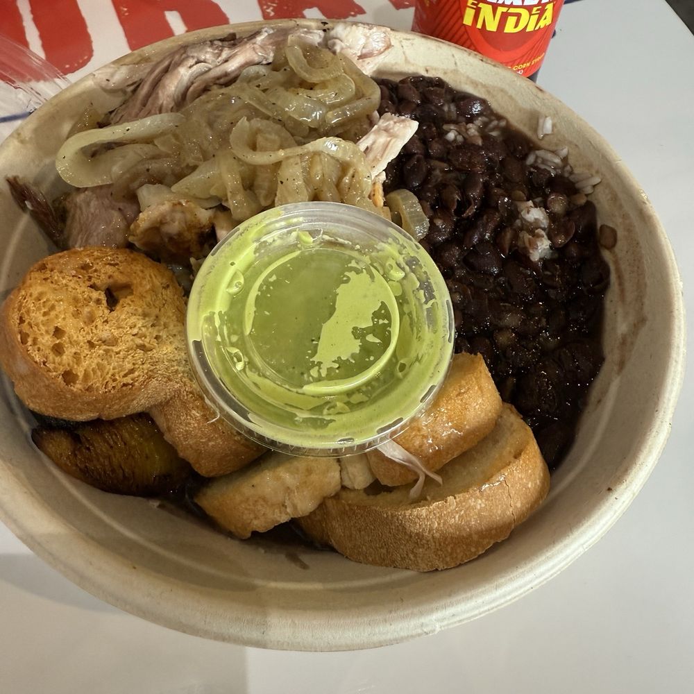 Box Of Cubans - Bowl of rice with Pernil sweet plantains and garlic bread. - Cuban Near Me - Tampa, Florida Box Of Cubans - Bowl of rice with Pernil sweet plantains and garlic bread. - Cuban Near Me - Tampa, Florida
