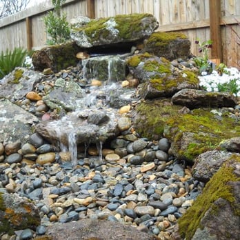 Taylor Made Landscape & Design - a waterfall in a garden - Landscape Architects or Designers Near Me - Exeter, California Taylor Made Landscape & Design - a waterfall in a garden - Landscape Architects or Designers Near Me - Exeter, California